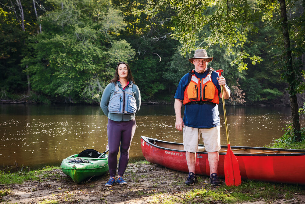 Stefani Covino and John Marsland get ready to paddle on the Blackstone River.