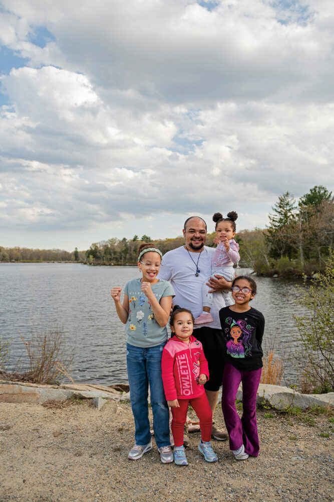 A father with his four daughters enjoy an afternoon at D.W. Field Park in Brockton, Massachusetts. 