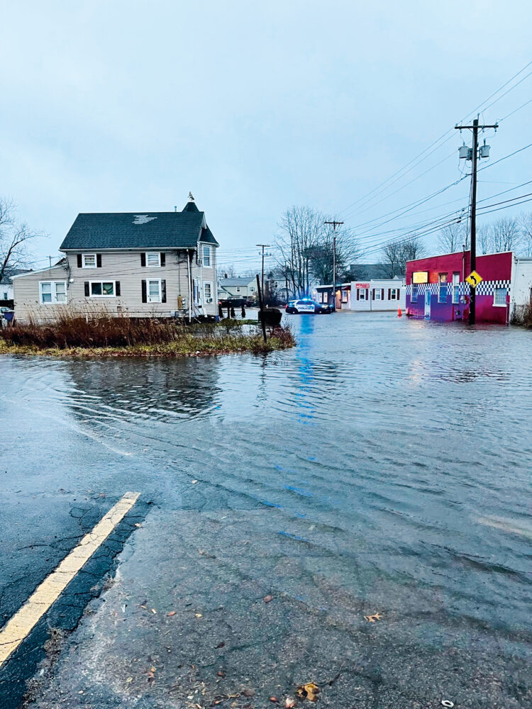 Market Street in Warren near the Palmer River frequently floods. Photo by Kate Michaud for MyCoast.